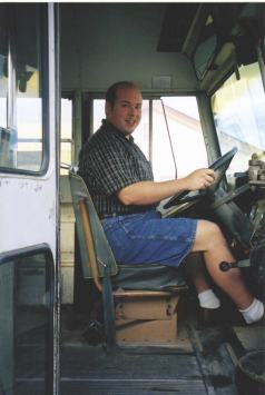 Chad driving 1969 International school bus.